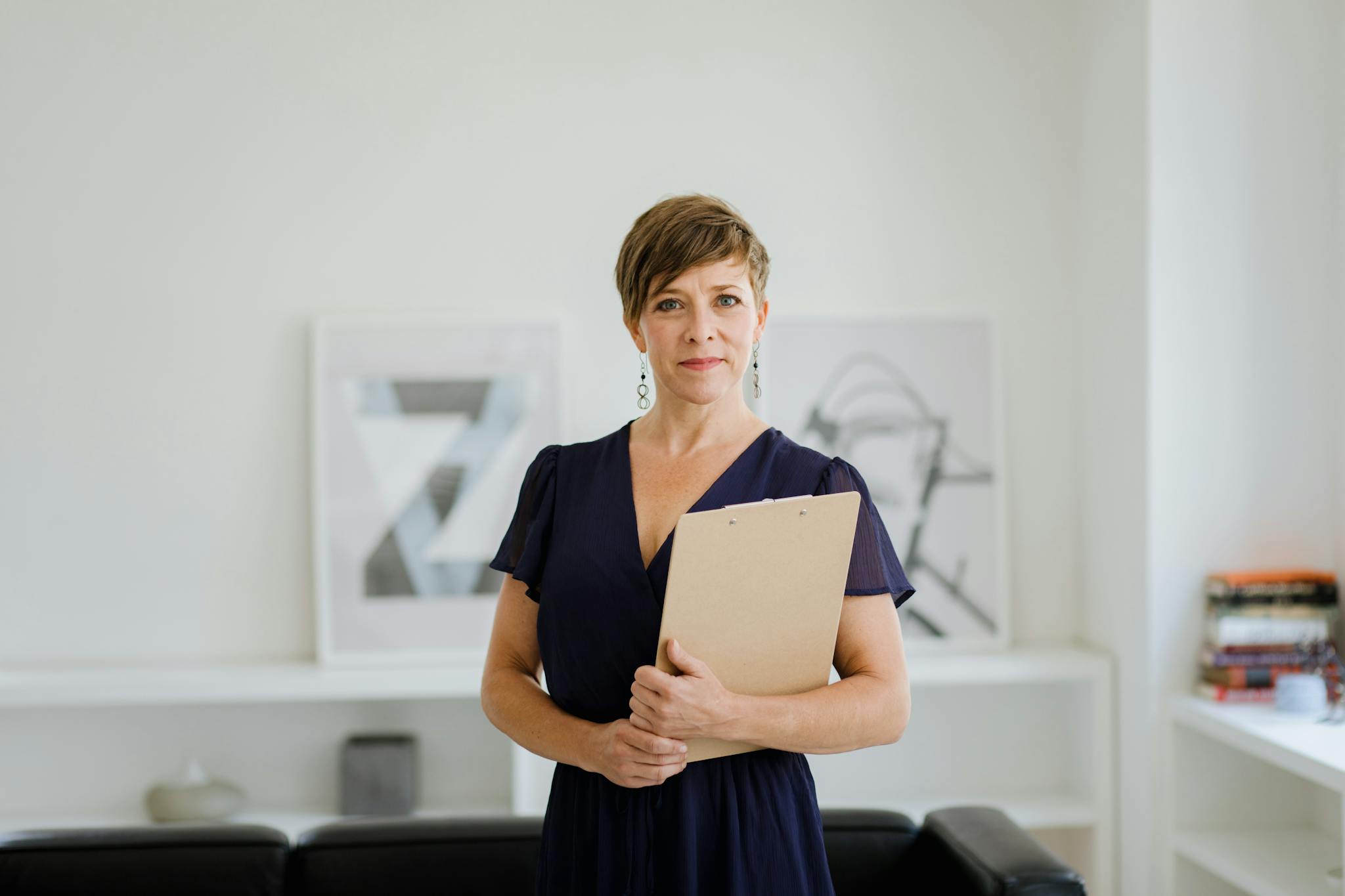 Confident Woman With Short Hair In Office