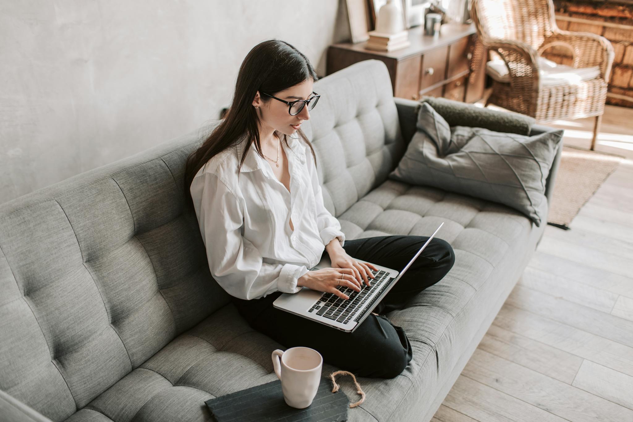 Woman In A Cozy Home Setting Working